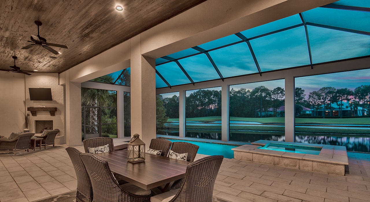 back patio and pool of legendary home