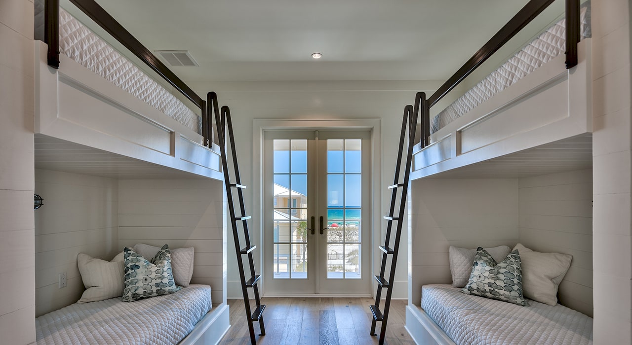 Bedroom with bunk beds in Regatta Bay residence