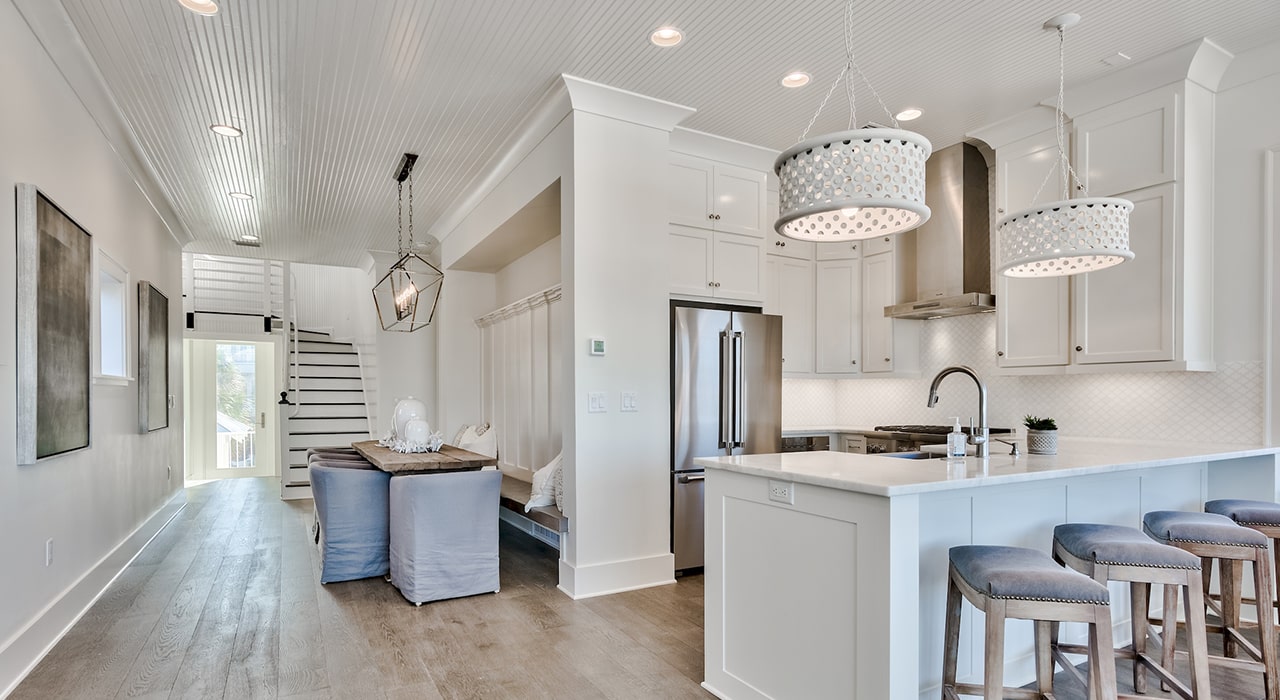 Kitchen, dining, and entry of Regatta Bay residence